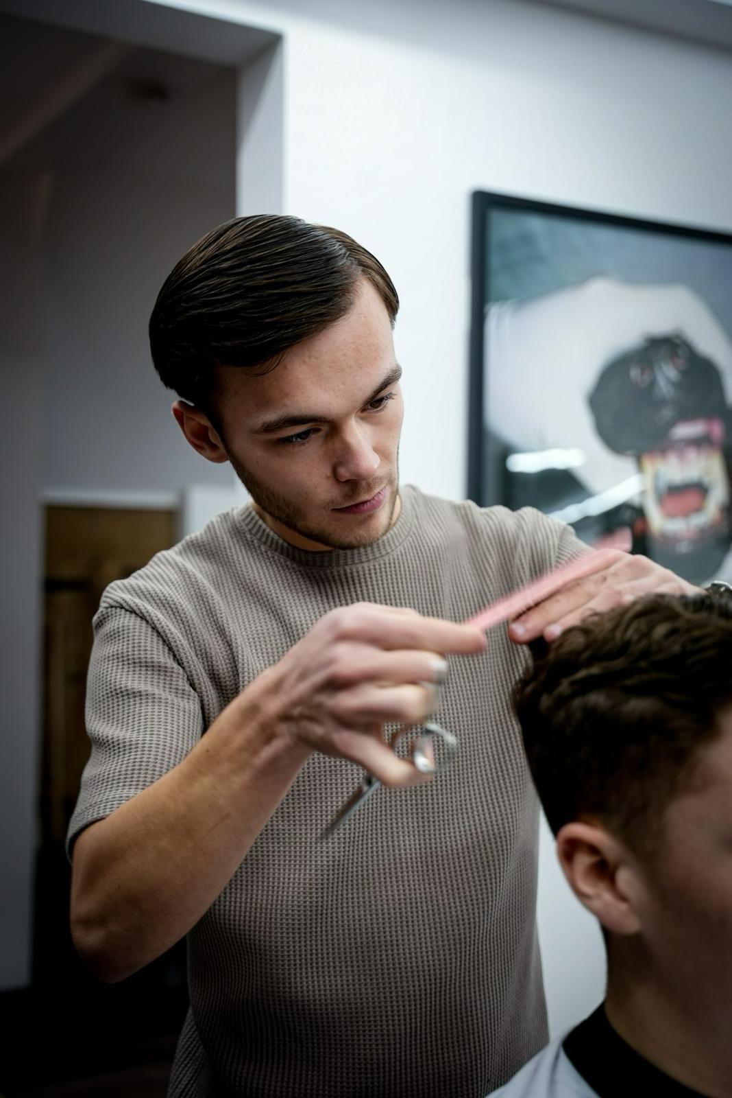 Max cutting hair at ILL Fate Barber Co