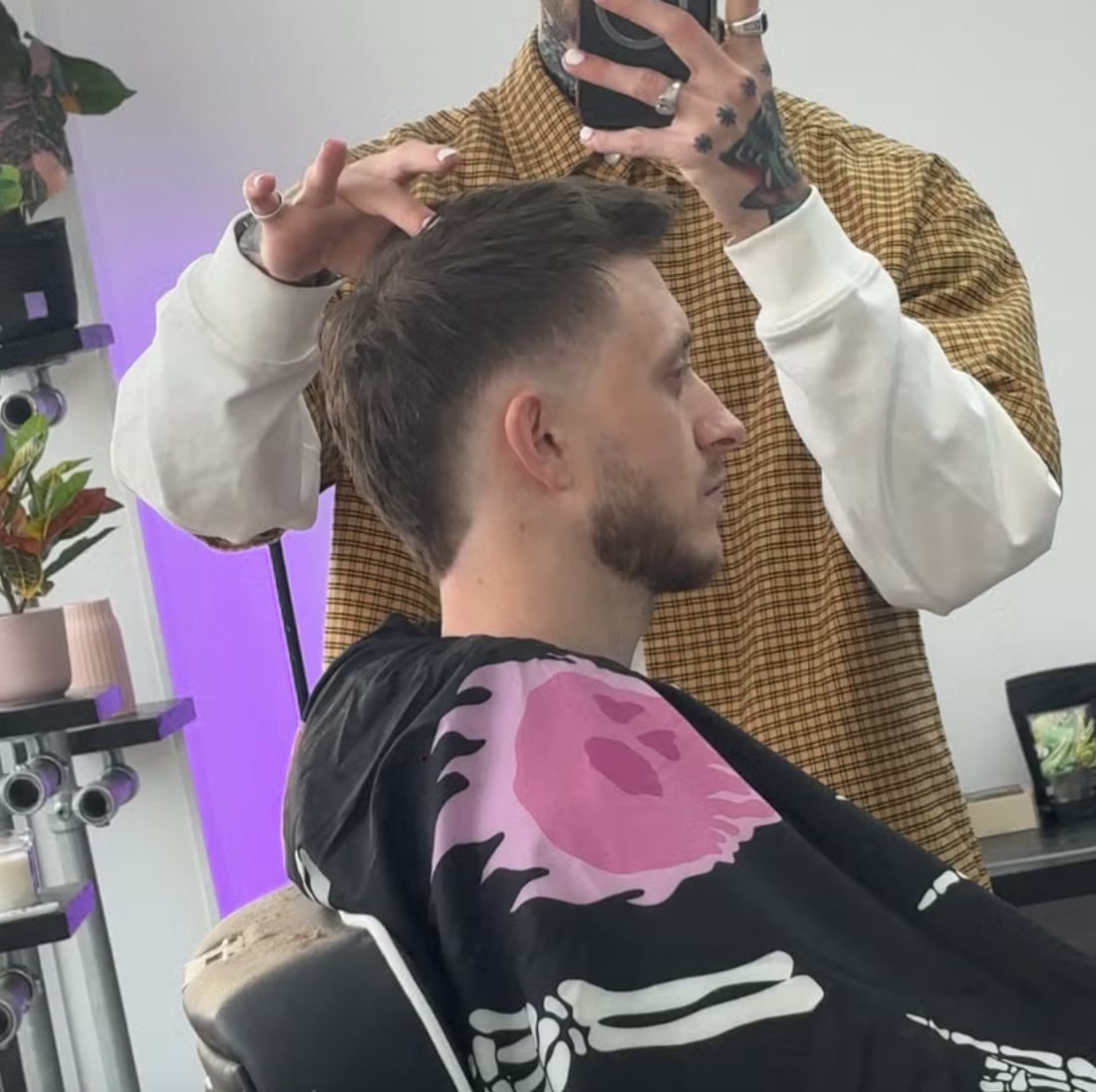 Finished haircut in ILL Fate Barber Co chair